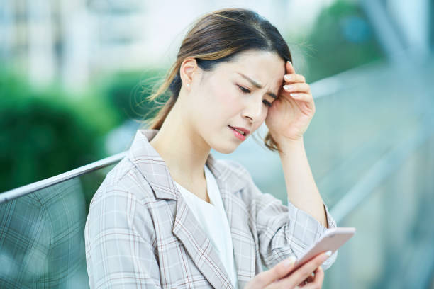 istock Young woman feeling unwell outdoors 1442253036