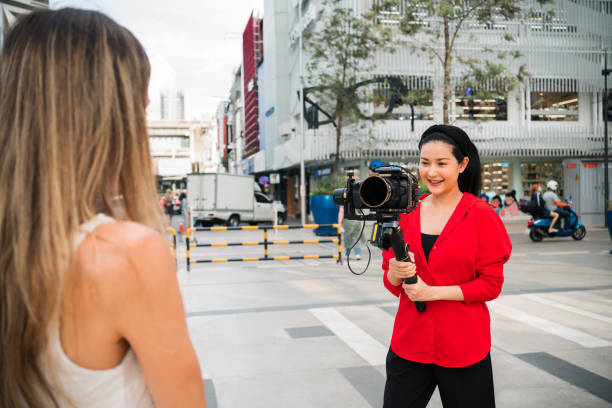 istock Woman try to shoot a videography. Learning something new 1442253361