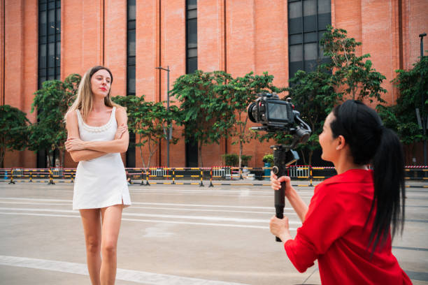 istock Woman try to shoot a videography. Learning something new 1442253363