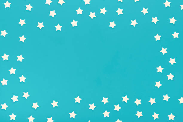 istock frame of sprinkles over blue background, toned style 1442255785