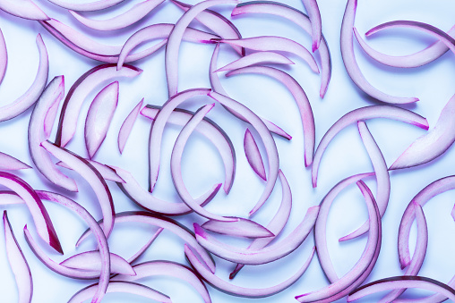beautiful fresh sliced red onions background, trendy Very Perry style