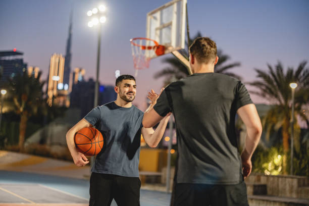 istock Multi Ethnic Team Mates Talking Before The Game In Dubai 1442258668