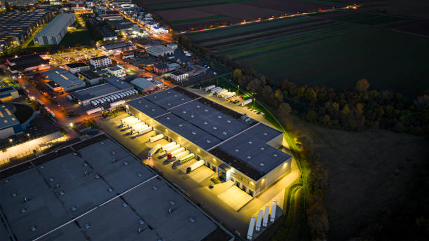 istock Distribution warehouse at dusk - aerial view 1442259661