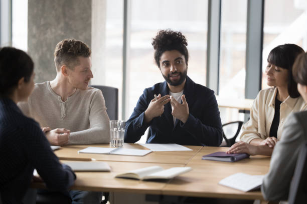 istock Diverse colleagues brainstorming, share ideas in office boardroom 1442259665
