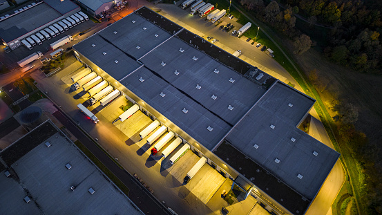 Distribution warehouse at dusk - aerial view