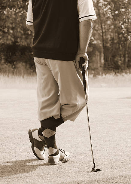 Antique golfer stock photo