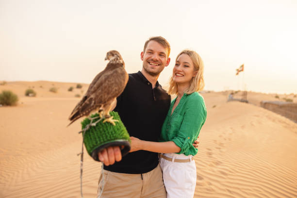 istock Caucasian Tourist Try Falconry In Dubai 1442260744