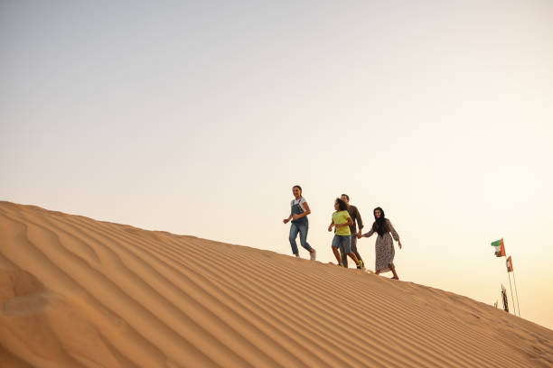 istock Family On The Dune In Dubai 1442260780