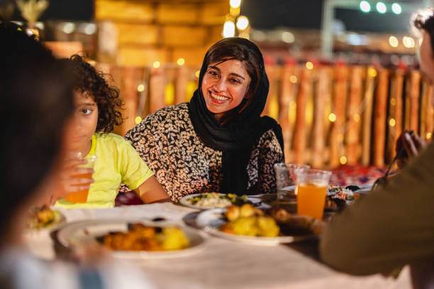 istock Middle Eastern Female At An  Authentic Dinner In A Desert Camp In Dubai 1442260919