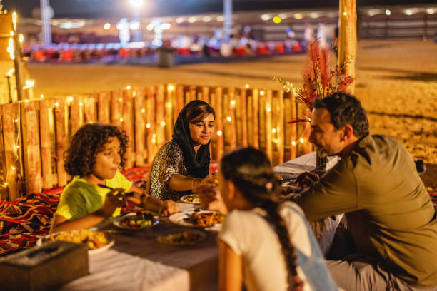 istock Family Spending Time Together At Dinner  In Dubai 1442260953