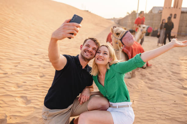 istock Just Married Couple Taking A Selfie With A Camel In Dubai 1442261263