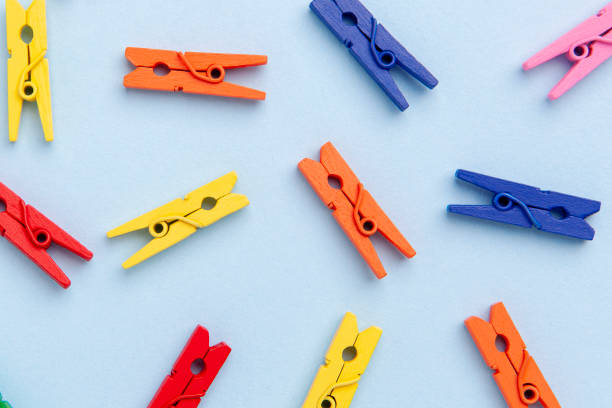 istock Formation of objects, repetitive group of clothespin colorful pattern, crowd top view 1442264523