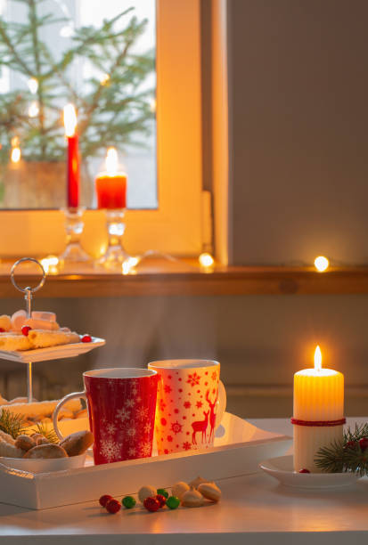 istock christmas decor and red cups with hot drink on kitchen 1442264809