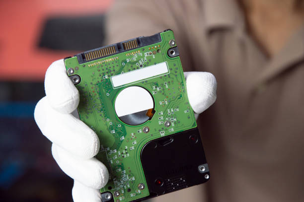 istock Hard disks are still popular in use today, holding a hard disk in your hand. 1442265687