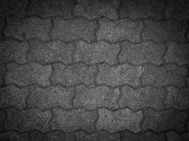 Paving with brick patterns in dark gray color