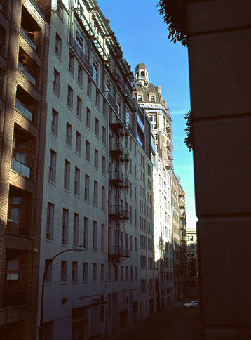 Mamiya m645 1000s | Mamiya Sekor 55mm f2.8 | Kodak Ektachrome E100

Row of tenements with Victorian tower looking over