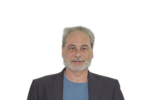 istock closeup foreground of a mature man with a beard on a white background 1442269749