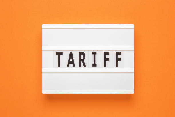 istock Lightbox with word tariff on orange background. Business concept on white background. Top view. 1442270070