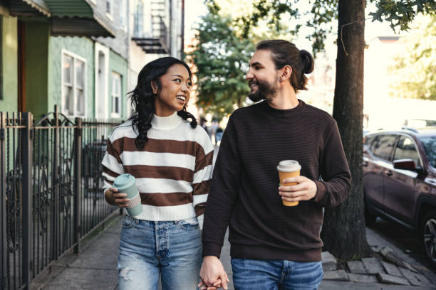 istock Young couple walking in Bushwick in Brooklyn 1442270106