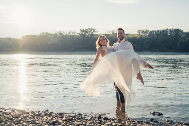 Hands with water splash, backlit by the evening sun.