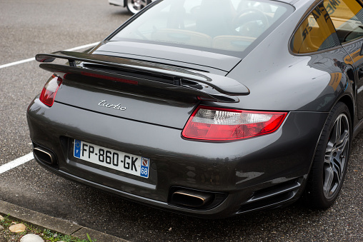 Mulhouse - France - 13 November 2022 - rear view of grey Porsche 911 turbo parked in the street