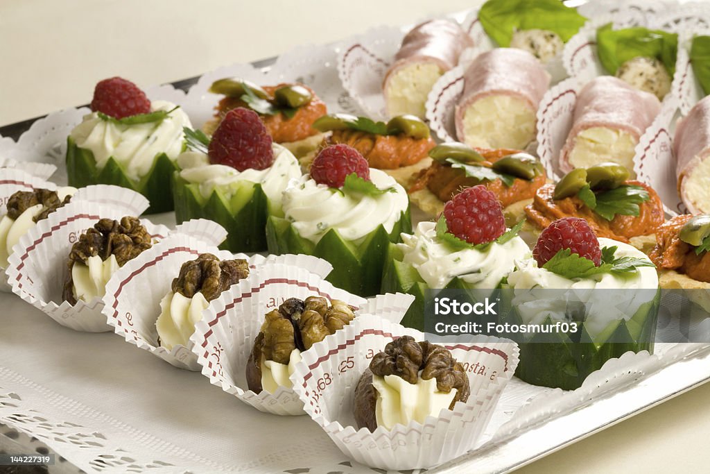 appetizer Small snacks on a plate ready to be served at the party Antipasto Stock Photo