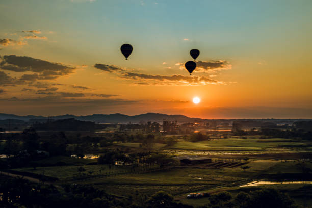 istock sunset with three balloons in the background 1442274424