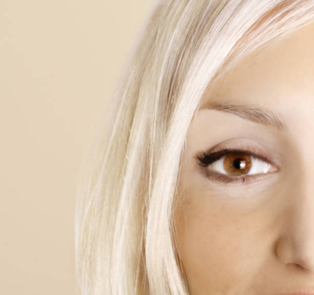 istock beautiful woman`s open brown eye 144227562