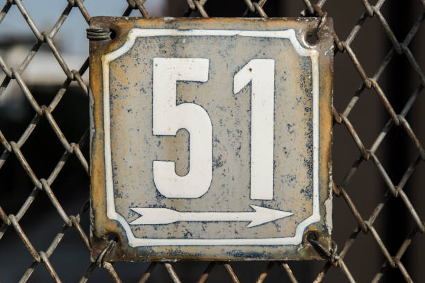 istock Weathered enameled plate number 51 1442275715
