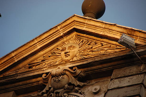 Partial part of a ceramic sun face home decor.