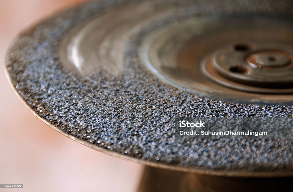Grinding disc - closeup shot A closeup shot of the grinding disc used for grinding welds. Black Color Stock Photo