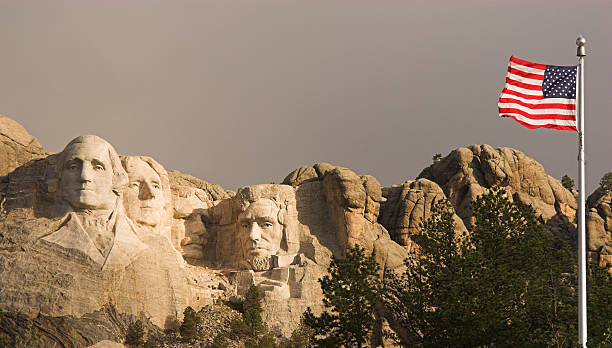 Mount Rushmore and American Flag stock photo