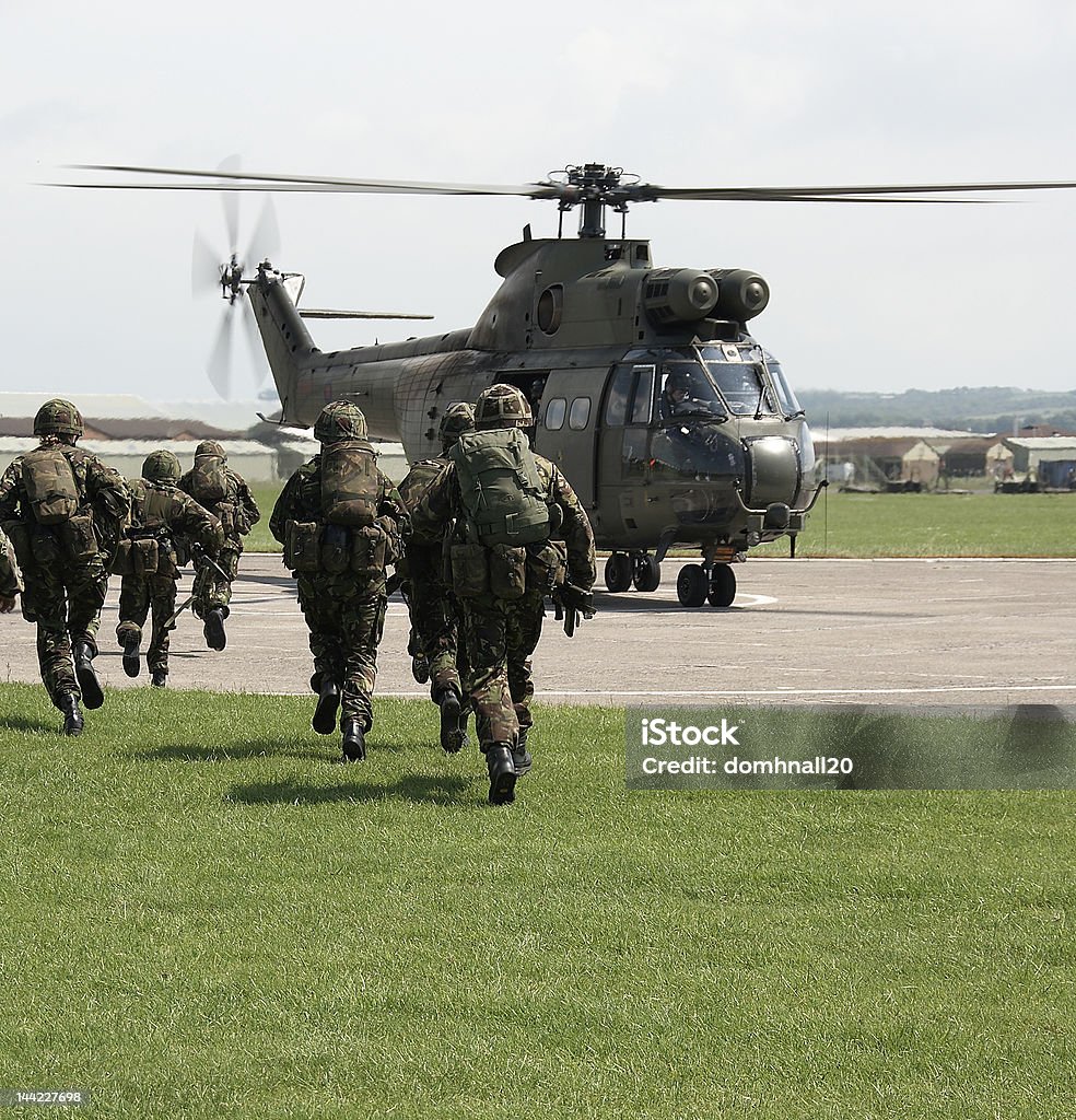 UK soldiers board puma helicopter British Army Exercise with helicopters Army Stock Photo