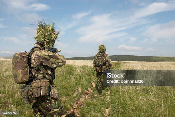 British Troops Watch As Helicopter Evacuates Casualty Stock Photo - Download Image Now