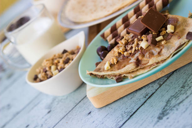 istock Chocolate pancakes with nuts and variations of chocolate 1442278163