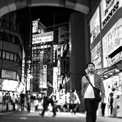 Tokyo, Japan - October 1, 2017. A group of pedestrians in the Akihabara District of Tokyo the capital of Japan. Tilt shift lens used.