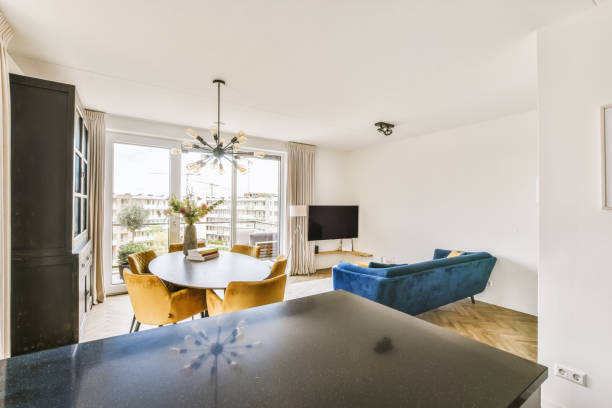 istock a living room with a dining table and a couch 1442279719