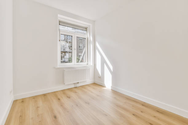 istock a living room with white walls and a window 1442281449