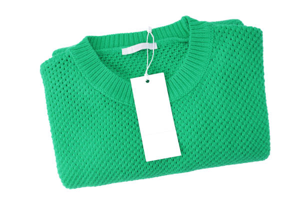 istock White blank rectangular clothing tag on green knitted sweater isolated on white background 1442282223