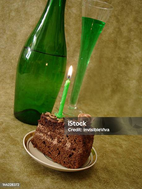 Chocolate Cake With Candle And Green Bottle Stock Photo - Download Image Now - Alcohol - Drink, Baked Pastry Item, Birthday