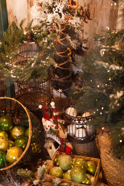 istock Christmas balls and decorations on shelves at shop. 1442284892