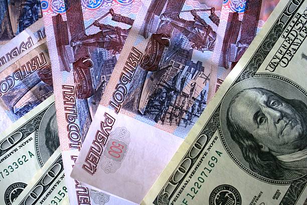istock US dollars and Russian roubles banknotes 144228859