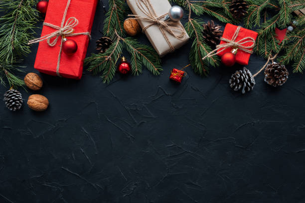 istock Christmas banner with many gift boxes with paper decorations on blue plaster background. Christmas background. 1442289098