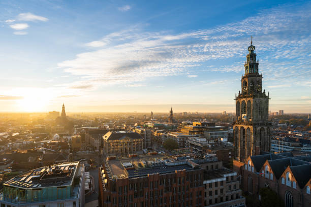 groningen and martini tower - groningen stockfoto's en -beelden