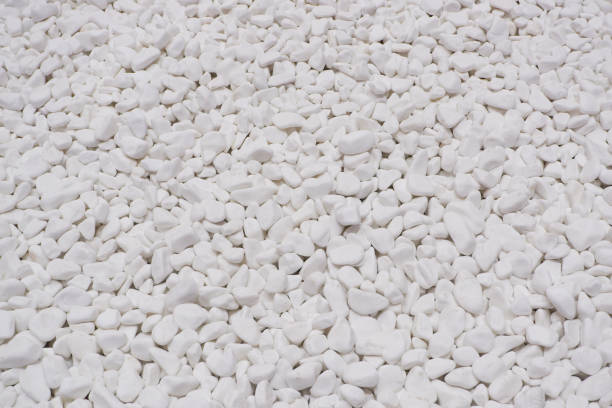 istock white river grit stones background. White marble gravel. Crushed stone texture. 1442290115
