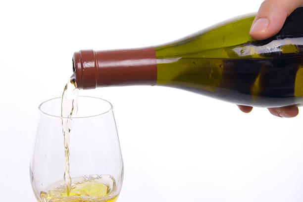istock Pouring a glass of wine 144229258
