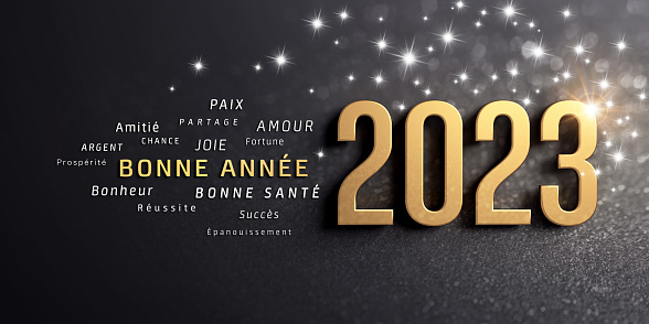 Happy New Year greetings in French language and 2023 date number colored in gold, on a glittering black card