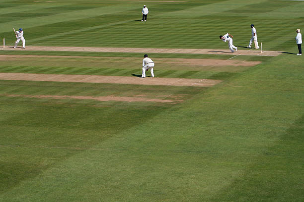 Batsman faces a ball from a fast bowler