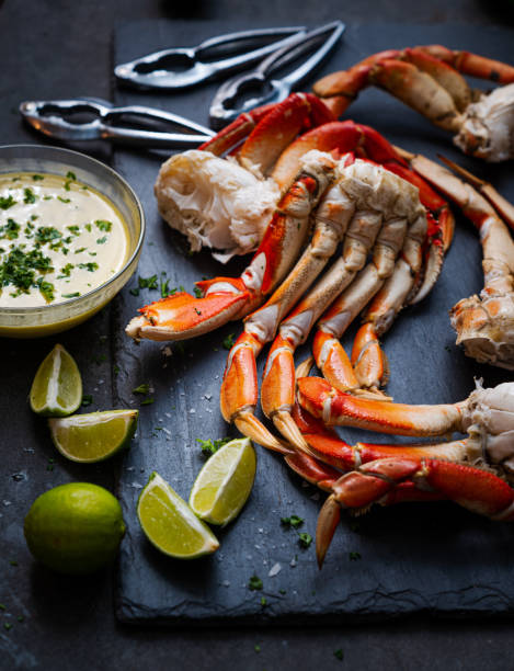 istock Crab legs with lemons and butter sauce 1442296807