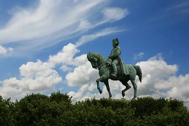 A statue depicts Napoleon on horseback, on Route Napoleon in France